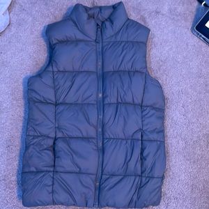 Vest never worn just ripped off tag